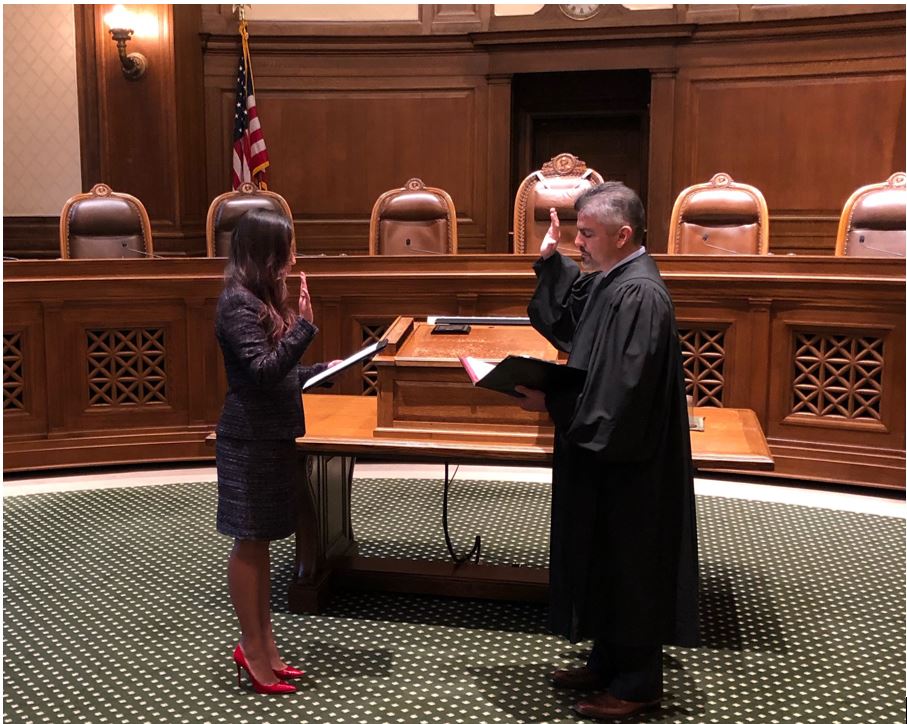 Ms. Hernandez  being sworn in by Justice Gonzalez of the Washington State Supreme Court .